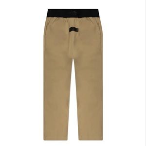 FEAR OF GOD ESSENTIALS
ESSENTIALS KID'S RELAXED TROUSER - OAK